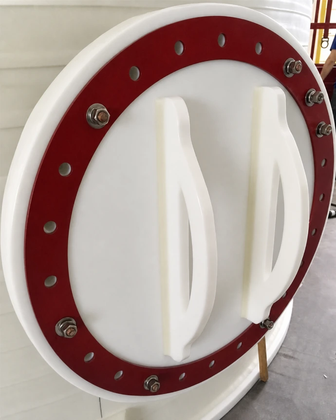 Bolted manway with red ring and molded handles